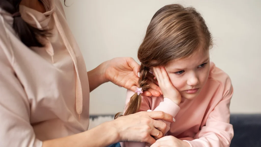 A Little Girl Is Upset Because Of An Ear Infection